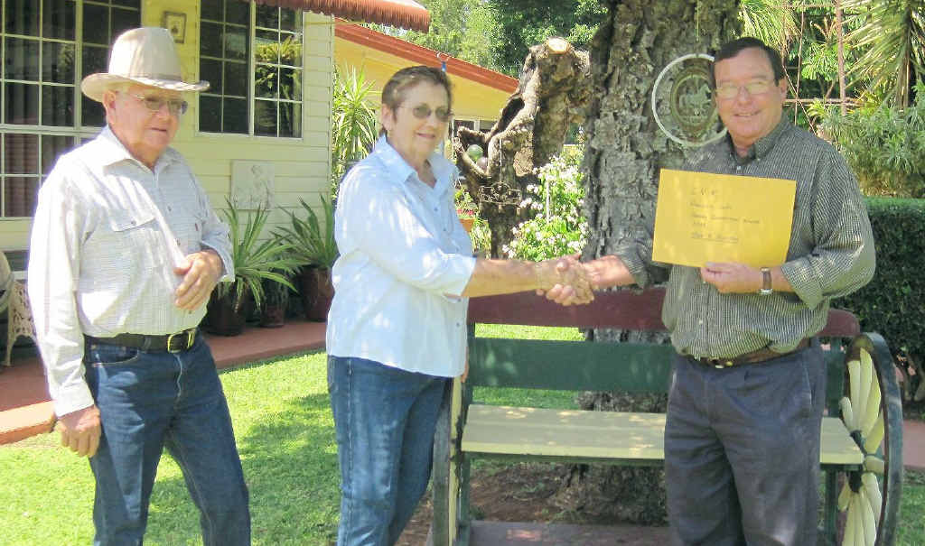 Peter and Kathleen Gleeson accept their award from Mayor Rob Chandler for taking out this year’s Barcaldine Regional Council Garden Competition. Peter and Kathleen Gleeson accept their award from Mayor Rob Chandler for taking out this year’s Barcaldine Regional Council Garden Competition.